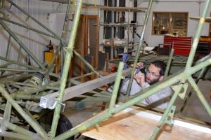 Stripped fuselage receiving detailed inspection and modifications. 